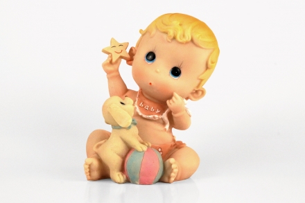 Figura de nen amb gosset i estrella